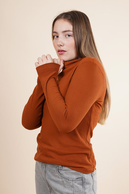 Blusa de mujer manga larga con cuello alto 252083