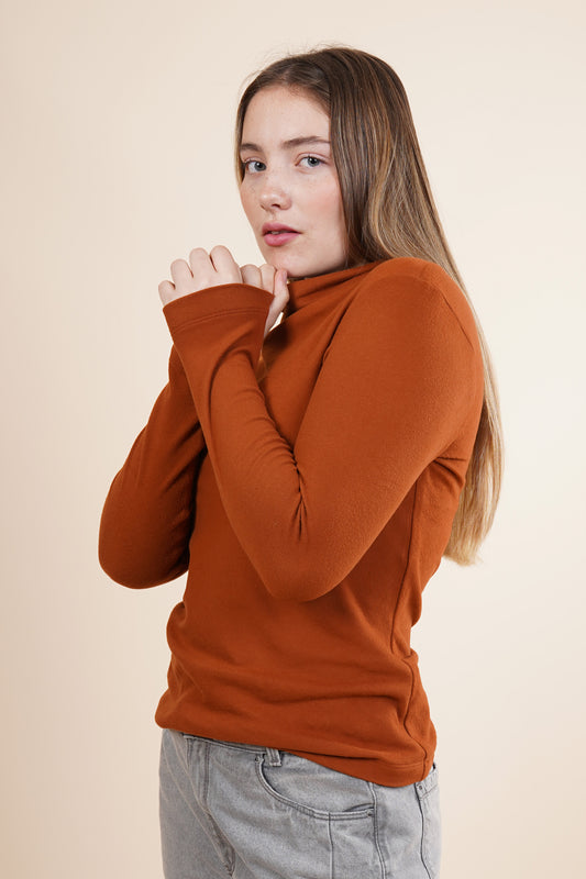 Blusa de mujer manga larga con cuello alto 252083